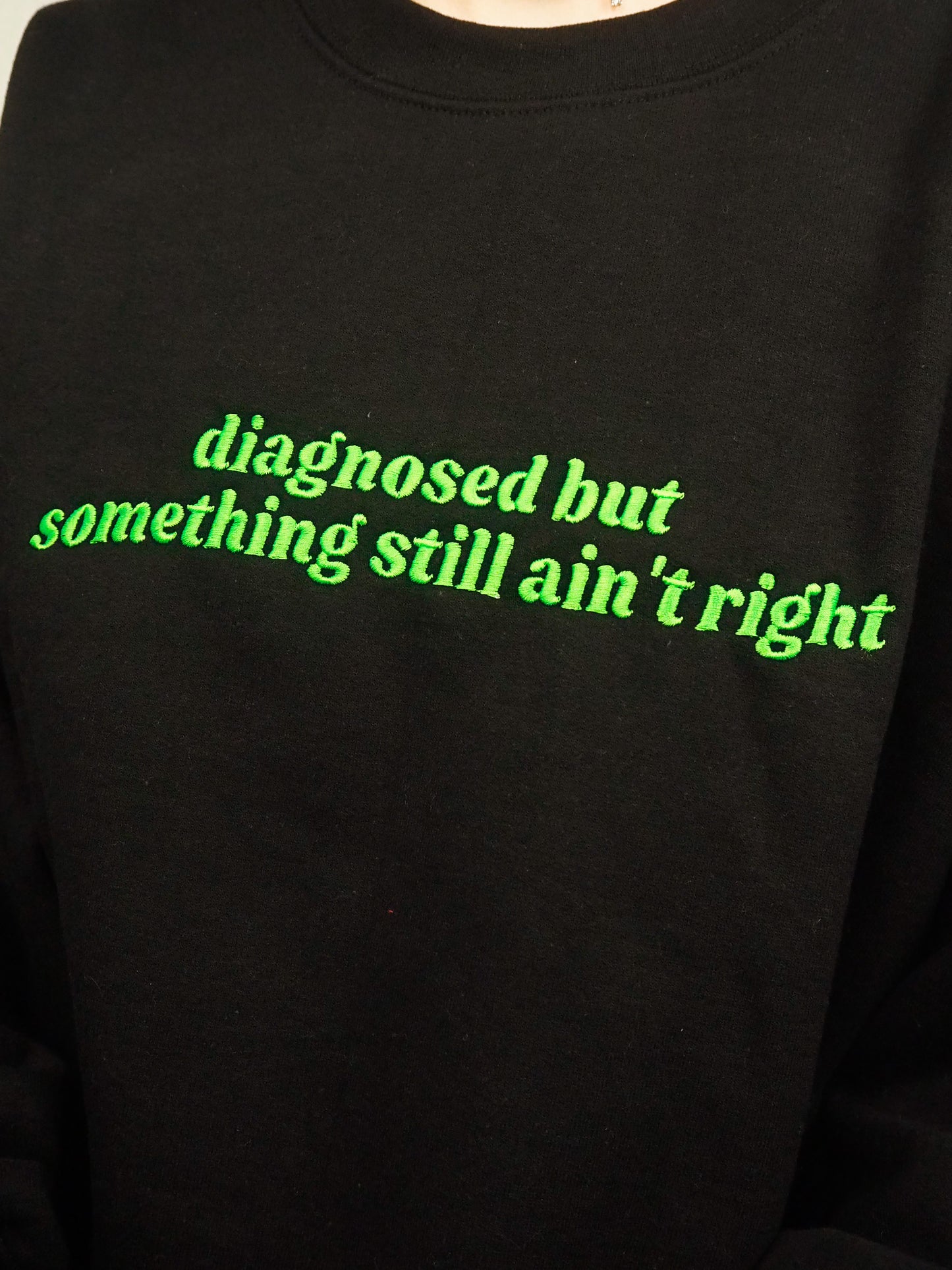 Diagnosed But Something Still Ain’t Right embroidered crewneck sweatshirt - Tired Girl Apparel