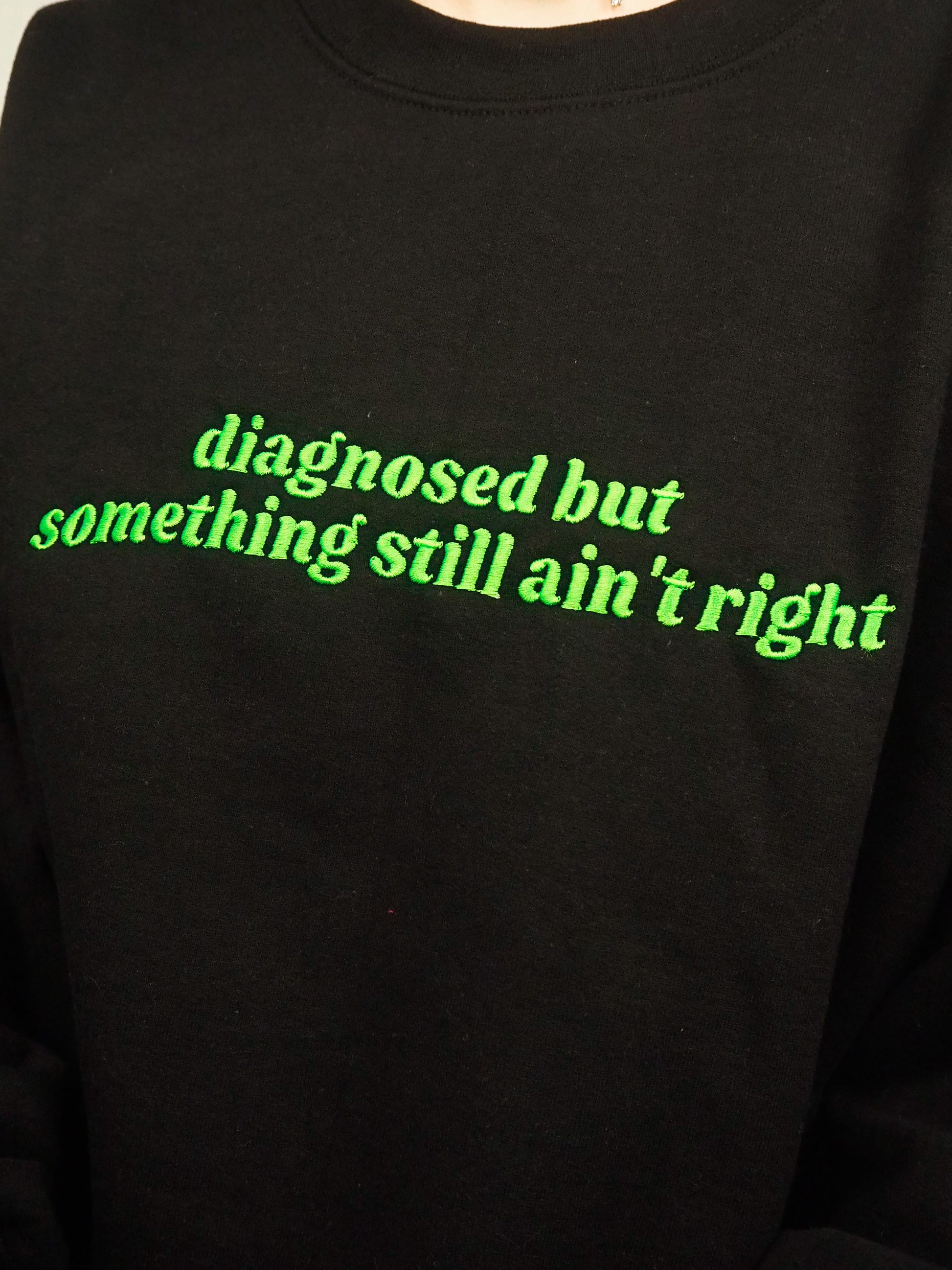 Diagnosed But Something Still Ain’t Right embroidered crewneck sweatshirt - Tired Girl Apparel