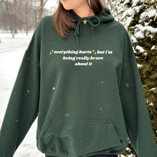 ✨Everything Hurts✨ but I'm being really brave about it hooded sweatshirt