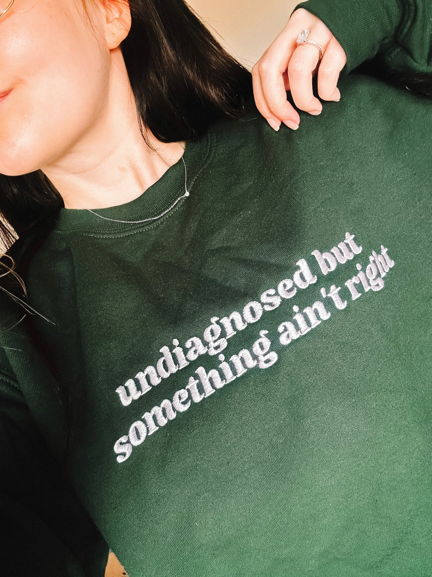 Undiagnosed But Something Ain’t Right embroidered crewneck sweatshirt