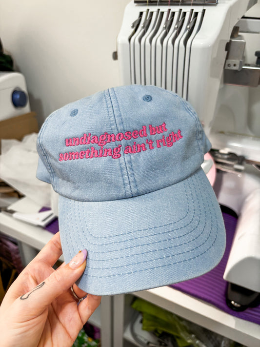 Undiagnosed But Something Ain't Right embroidered baseball cap - Tired Girl Apparel