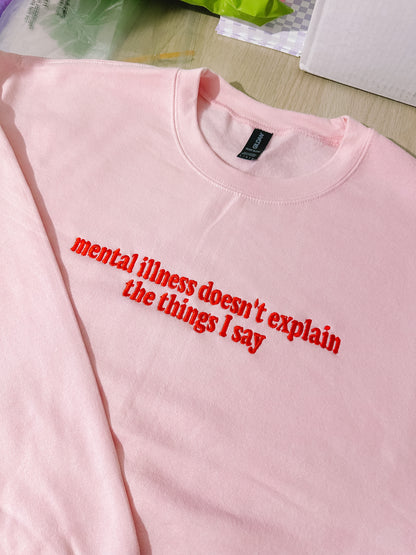 Mental Illness Doesn’t Explain The Things I Say embroidered sweatshirt