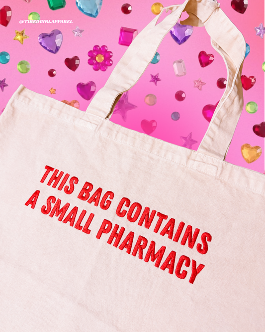 This Bag Contains A Small Pharmacy embroidered tote bag