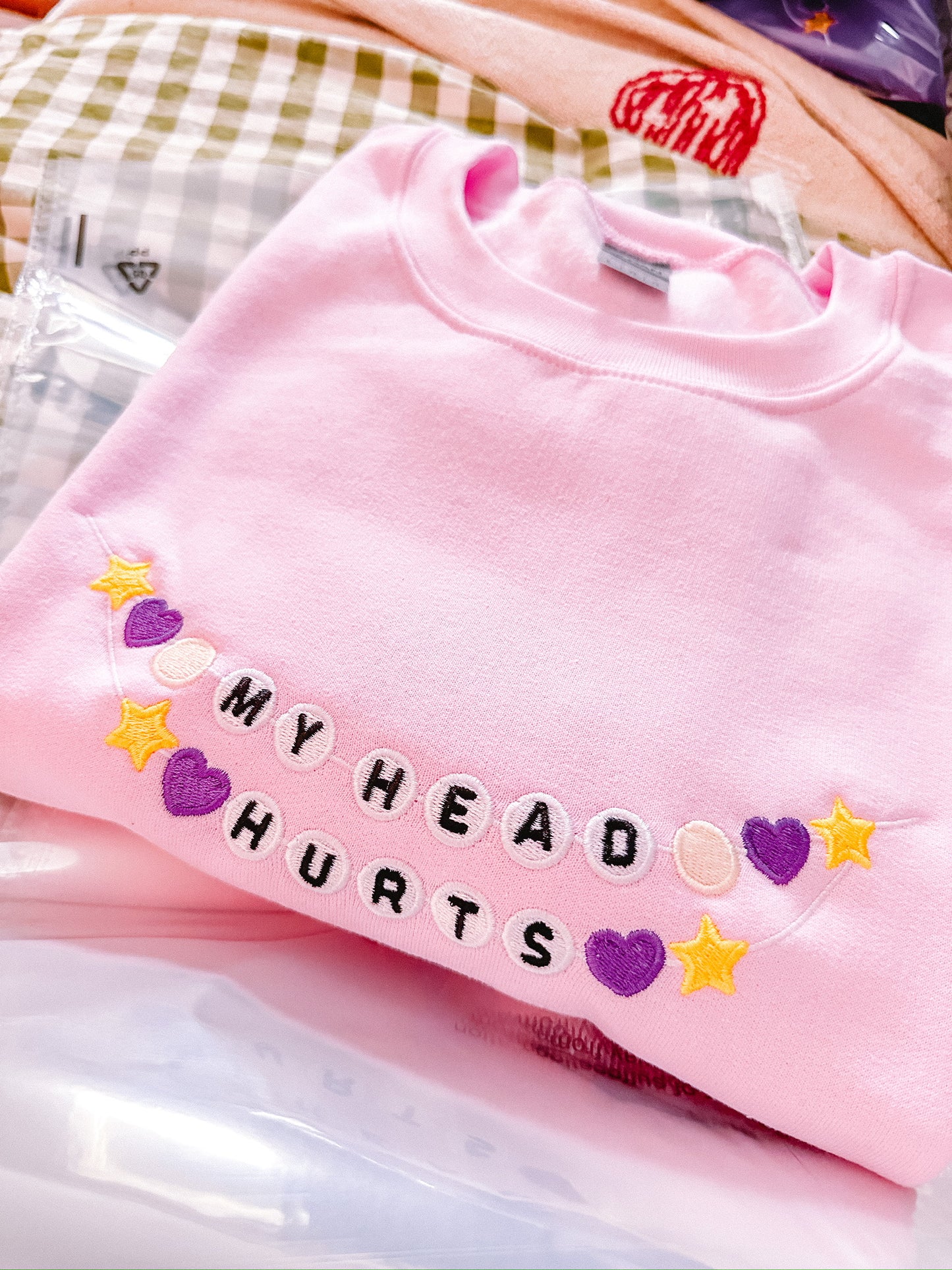 My Head Hurts Friendship Bracelet embroidered crewneck sweatshirt