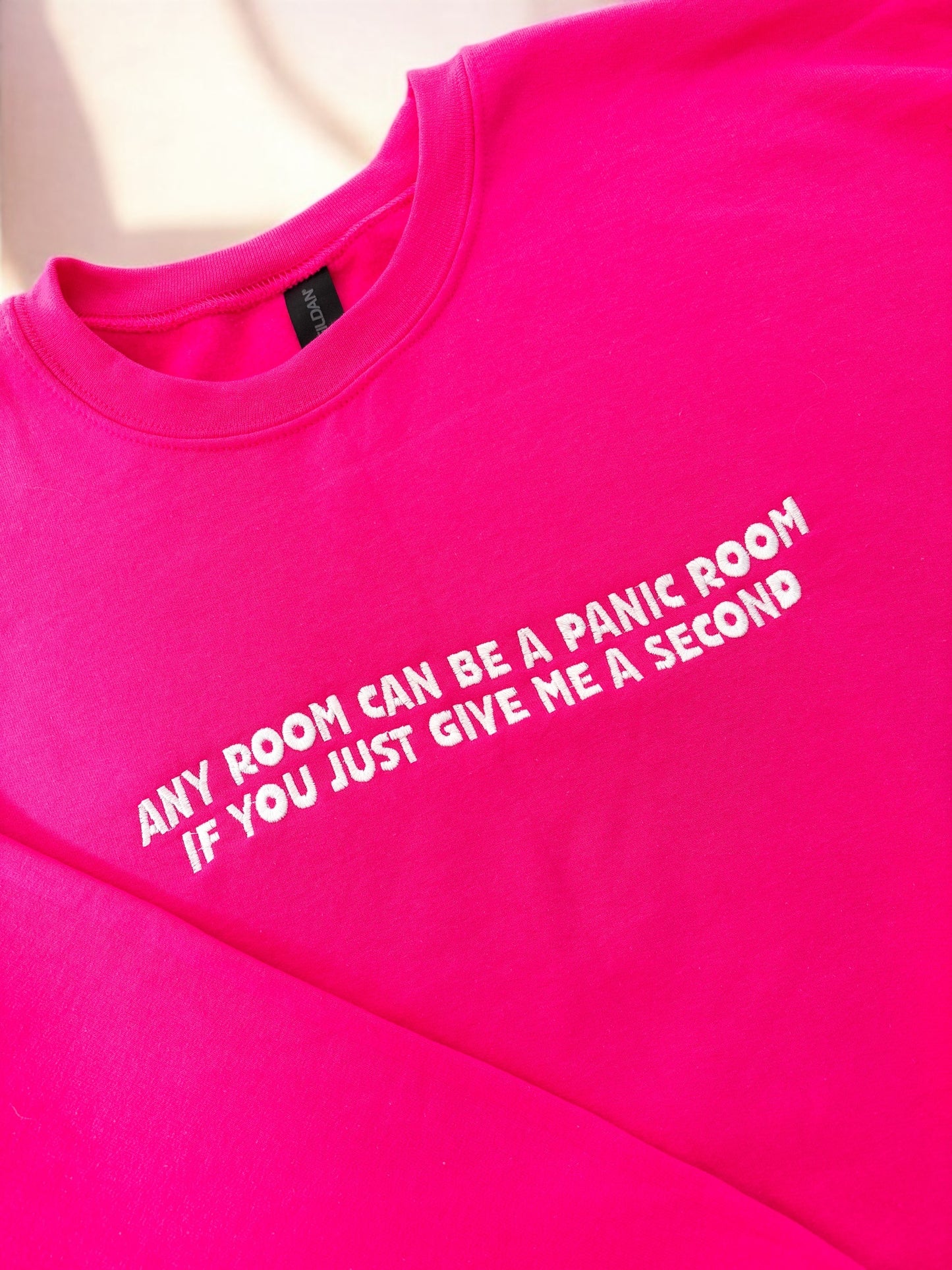 Any room can be a panic room embroidered sweatshirt