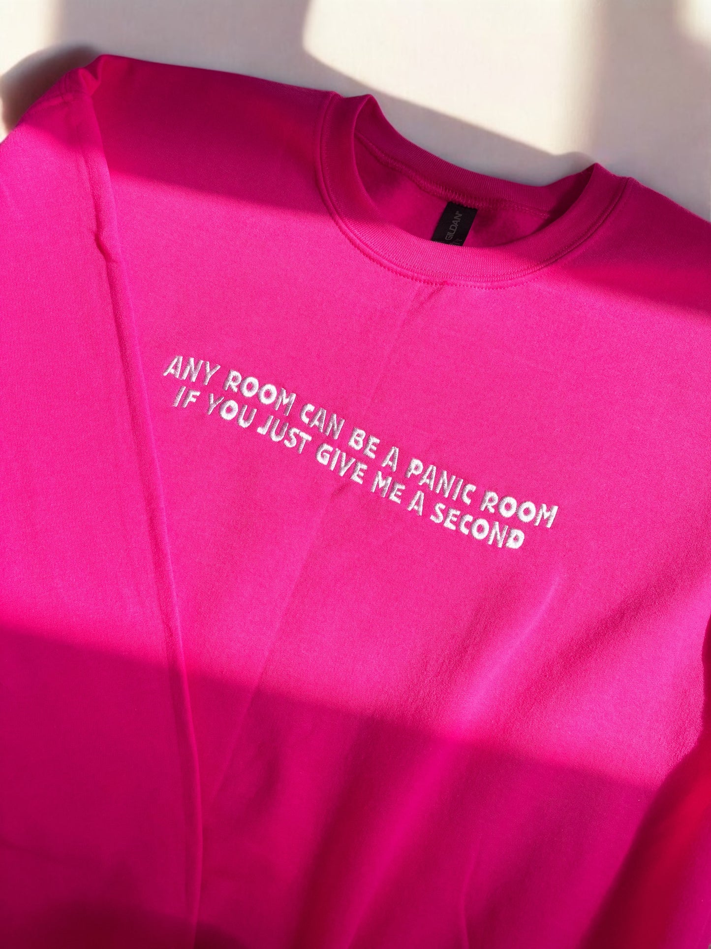 Any room can be a panic room embroidered sweatshirt