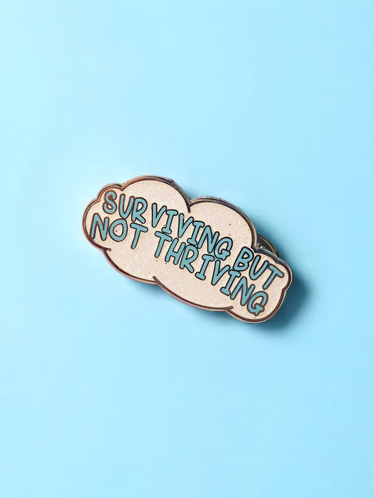 Surviving But Not Thriving enamel pin - Tired Girl Apparel