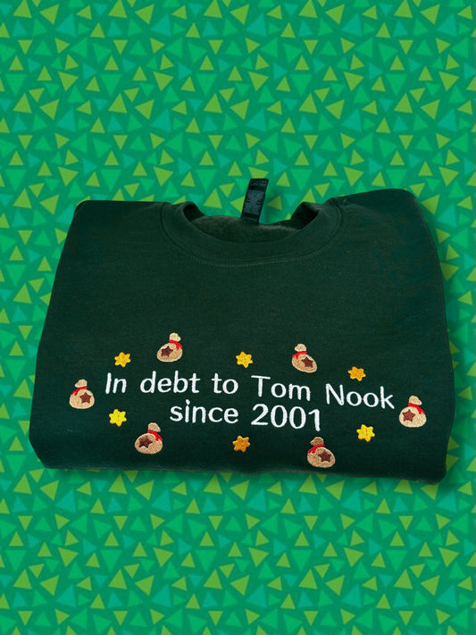 In Debt To Tom Nook Since 2001 embroidered sweatshirt