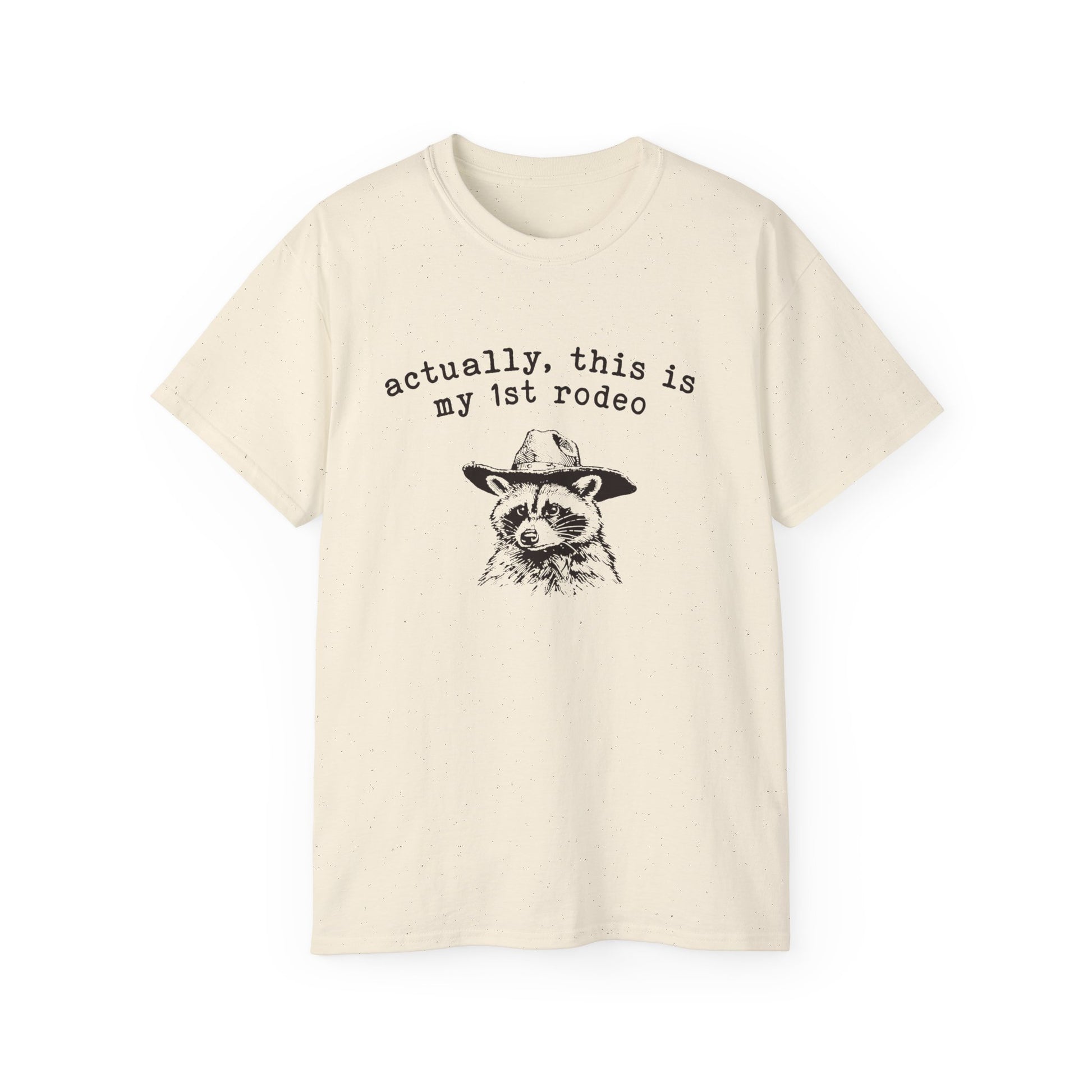 A natural t-shirt with a raccoon printed on it