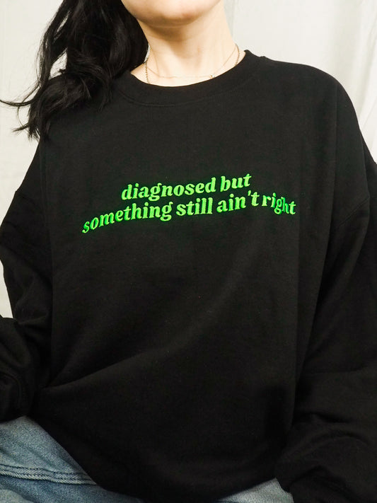 Diagnosed But Something Still Ain’t Right embroidered crewneck sweatshirt - Tired Girl Apparel