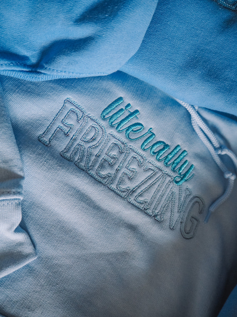 Literally Freezing embroidered hooded sweatshirt with snowflake sleeve detail - Tired Girl Apparel